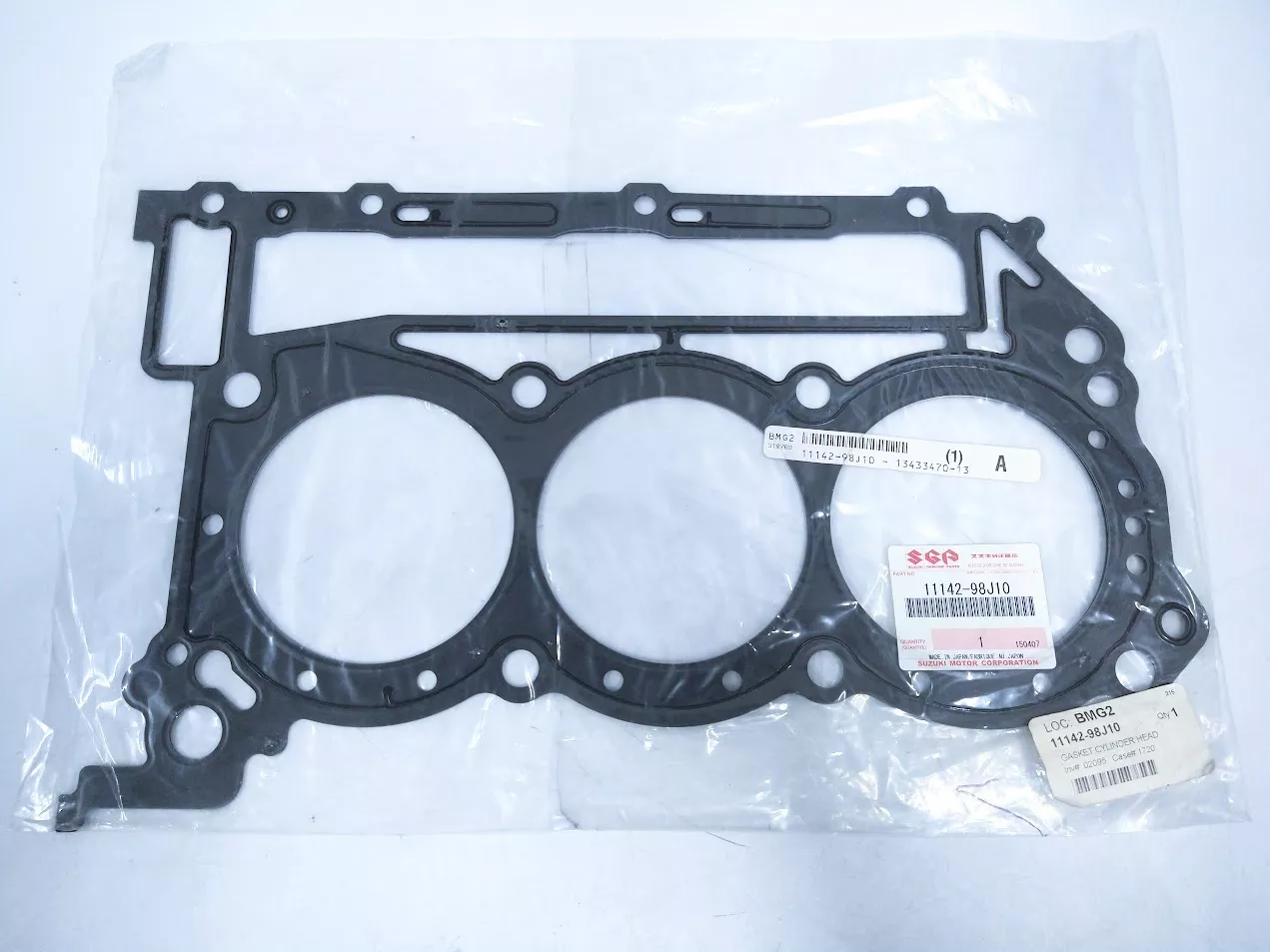 new-suzuki-11142-98j10-cylinder-head-port-gasket-oem -NEW- Suzuki 11142-98J10, Cylinder Head Port Gasket, OEM